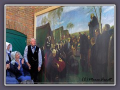 Gottesdienst im Freien - Fritz Mackensens Gemälde an der Kirchenmauer der Zions Kirche